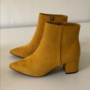Yellow heeled booties